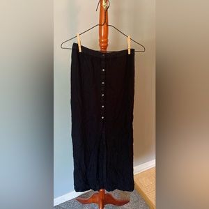 Black maxi skirt with buttons and slit